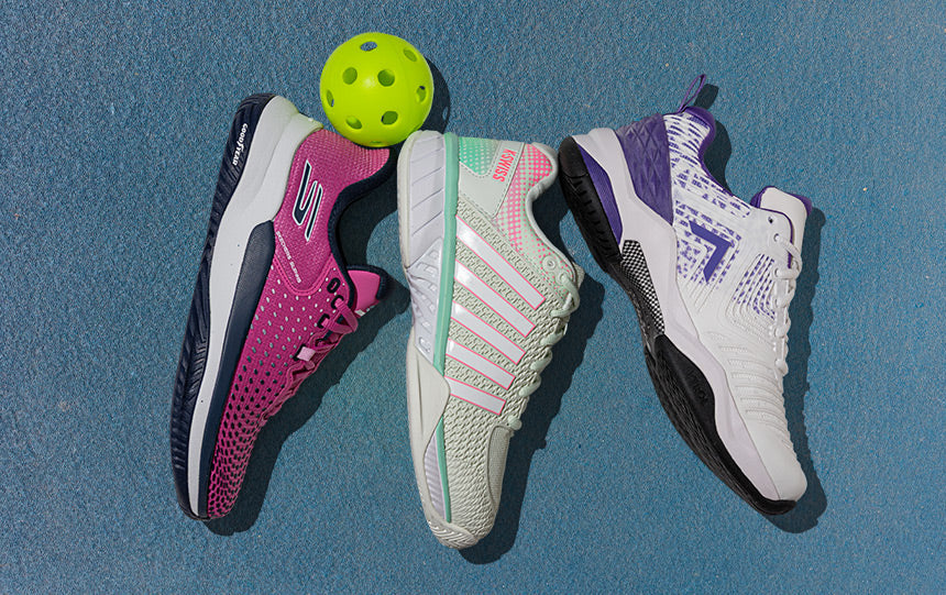Wilson Rush Pro 3.0 Women's Chambry Blue/White/Outer Space pickleball shoes on a light blue outdoor court.