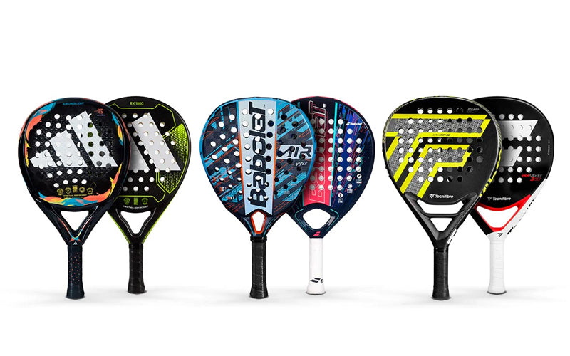 padel racquets on white background adidas babolat tecnifibre