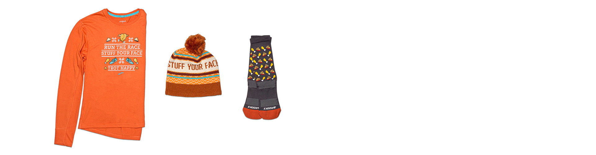 brooks trot happy collection distance graphic tee heritage pom beanie and tempo knit crew sock on white background