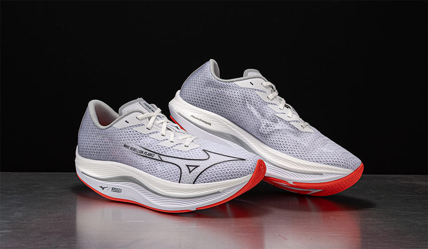mizuno wave rebellion flash 2 running shoes on black background