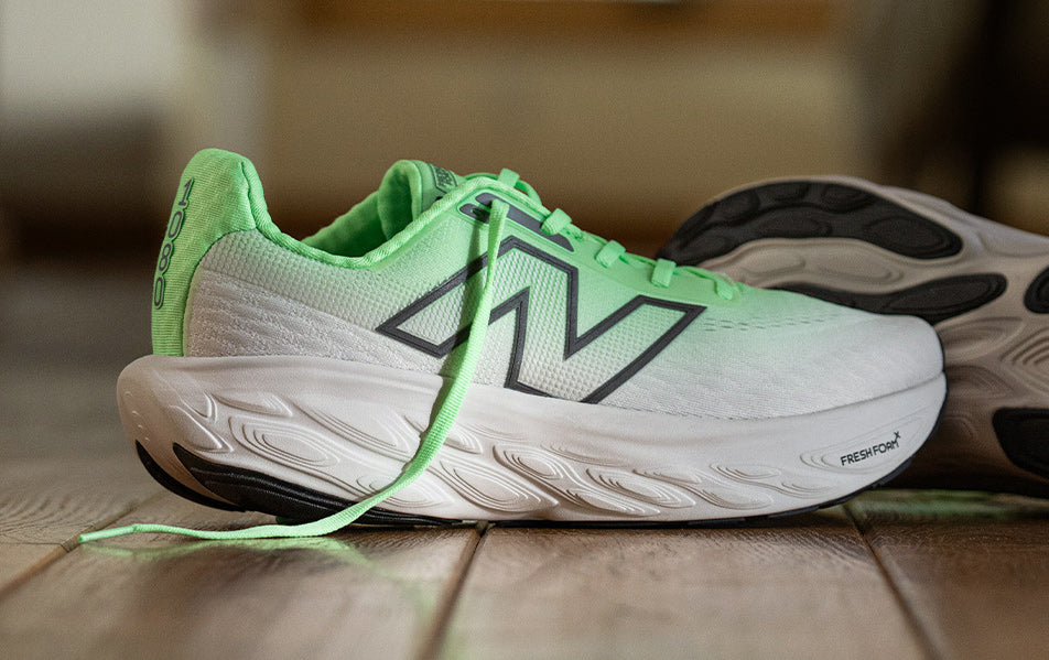 new balance running and tennis shoes on white background