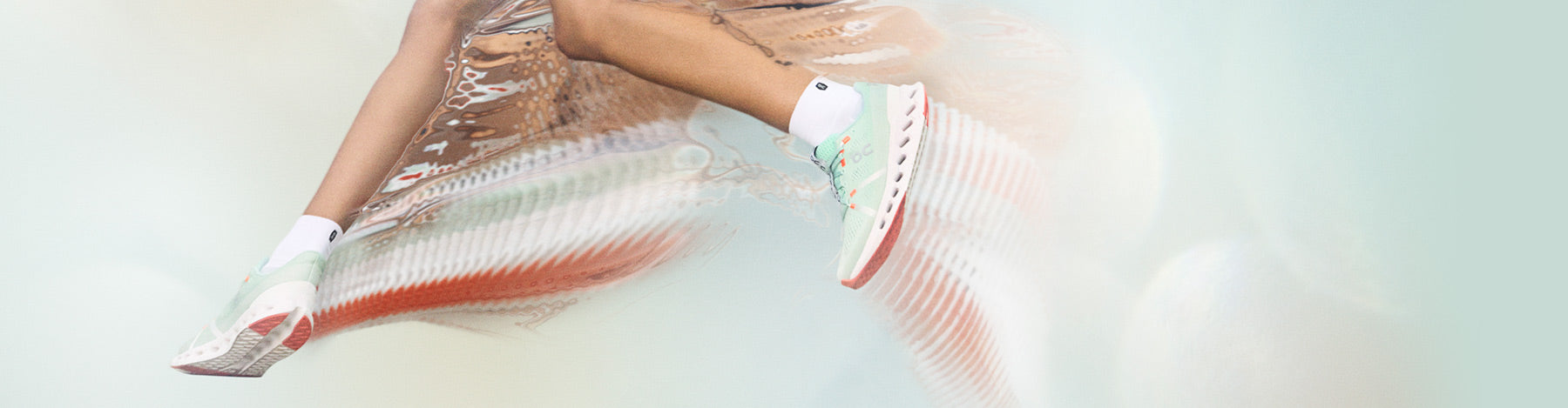 stylized image of a woman running in On Cloudsurfer running shoes