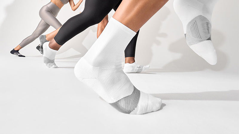 People running in Feetures socks