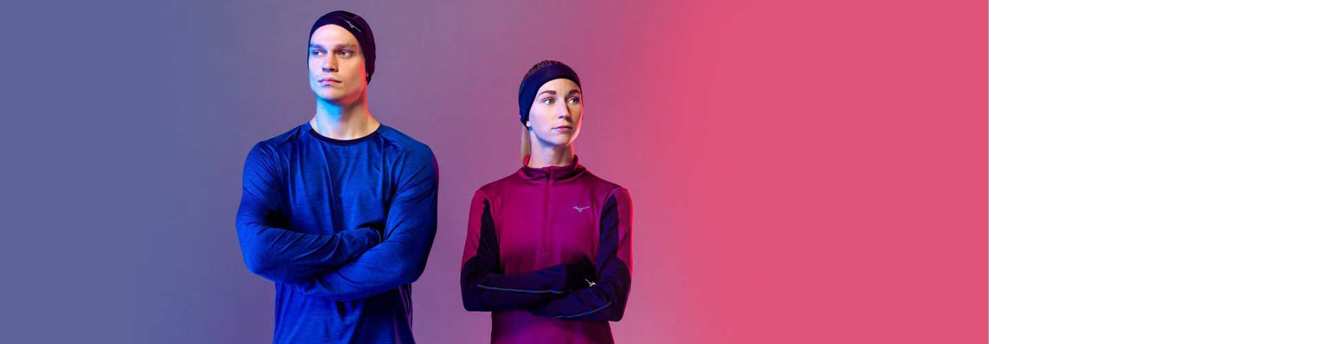 Man and woman in Mizuno running gear