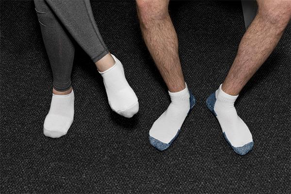 Thorlo tennis and running socks on models