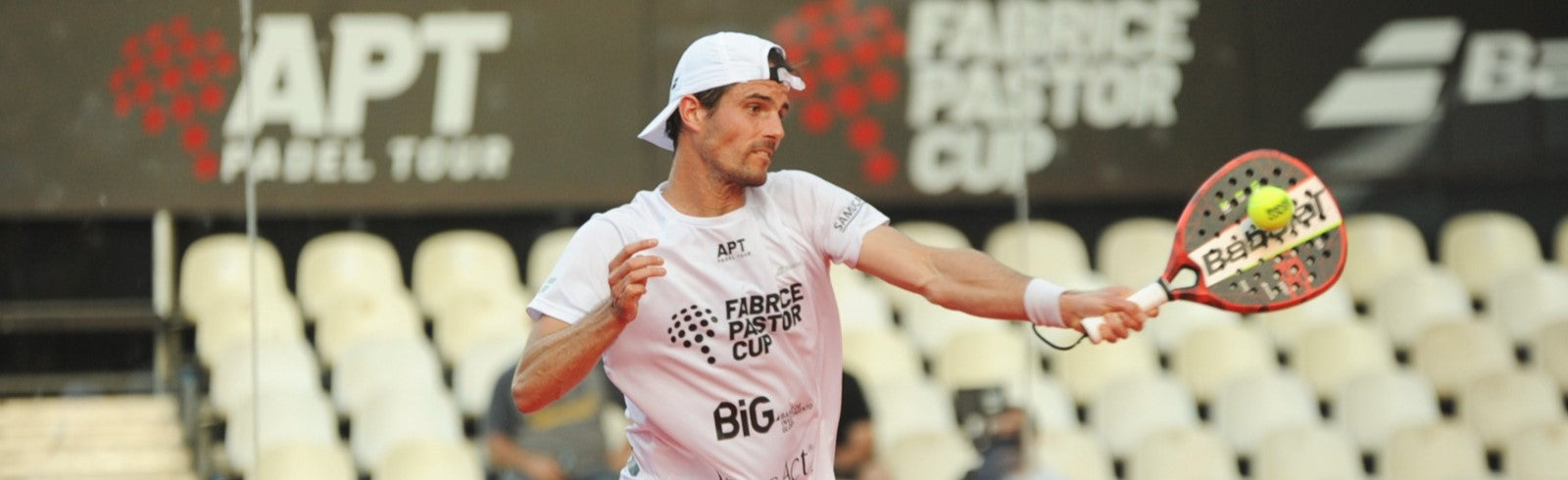 A male padel player at the APT Padel Tour