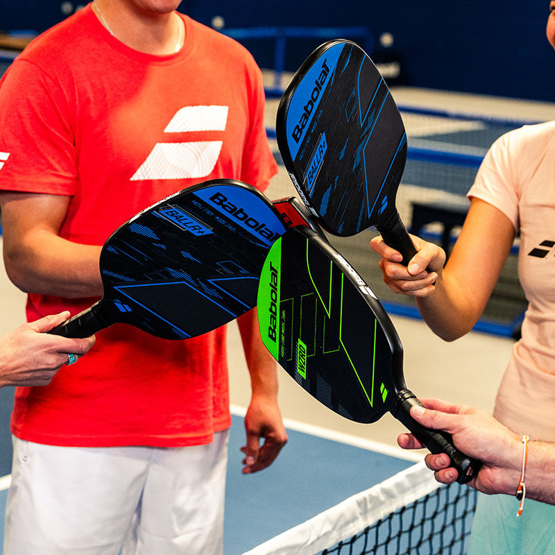 Players using Babolat pickleball paddles