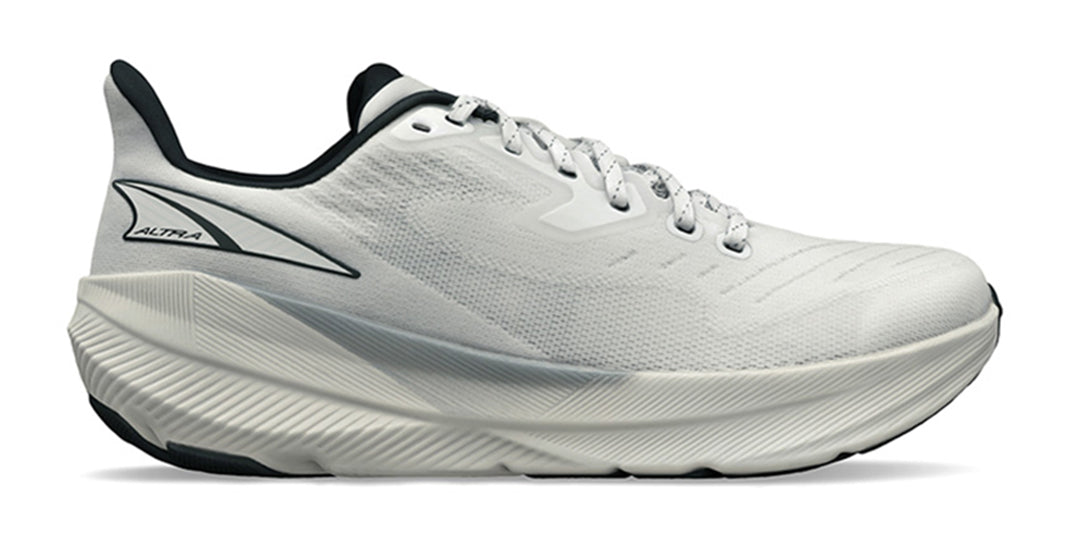 Lateral view of Altra Experience Flow running shoes on a white background