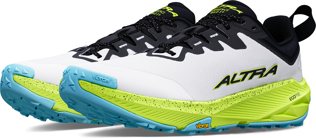 A pair of white Altra Experience Wild 3+ trail running shoes with black, yellow-green and blue accents on a white background.