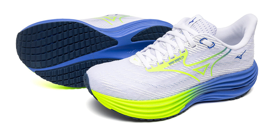 A pair of white Mizuno Wave Rider 29 running shoes with yellow-green and blue accents on a white background
