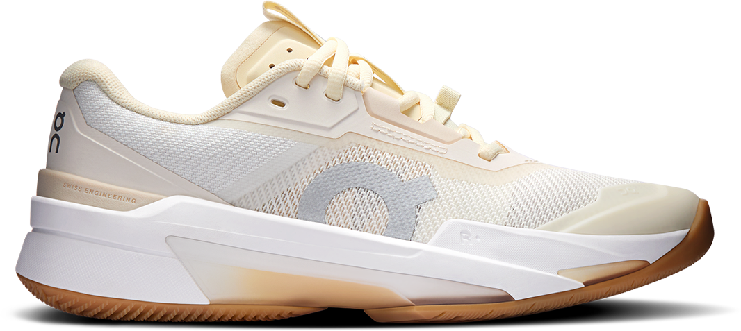 White and beige On The Roger Pro Fire tennis shoes on a white background