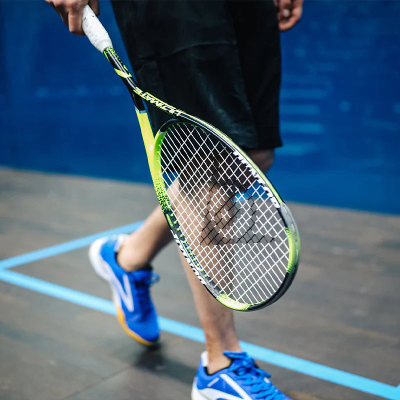 Man holding squash racquet