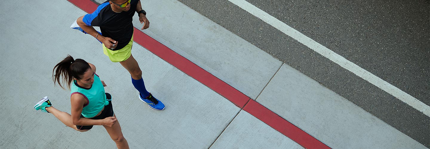 two people running next to red line