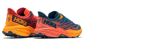 HOKA Speedgoat 5 trail running shoes on white background