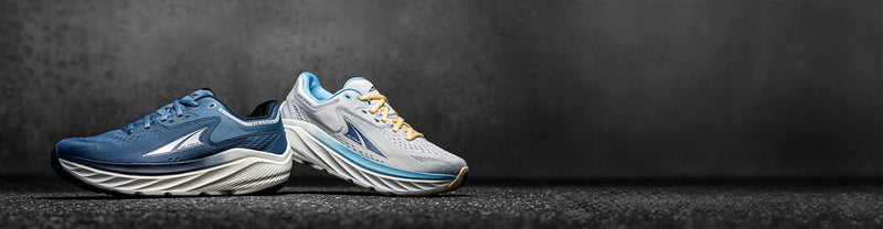 altra viaolympus running shoes on shadowy background