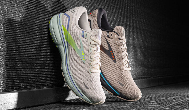 brooks ghost 15 running shoes on color block background