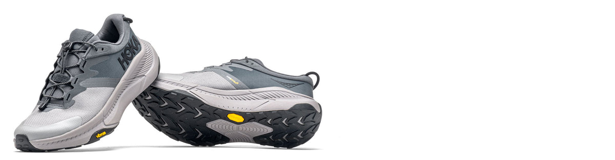 HOKA transport urban hiking shoes on white background