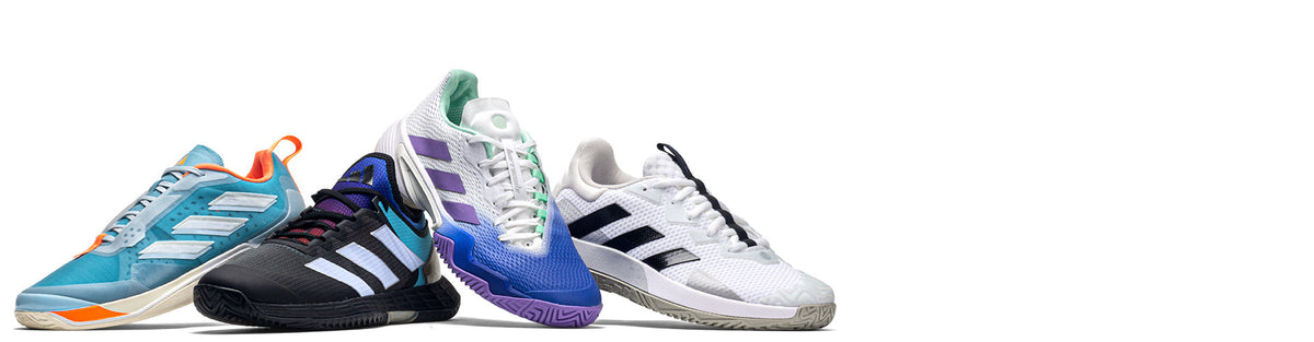 adidas tennis shoes on white background
