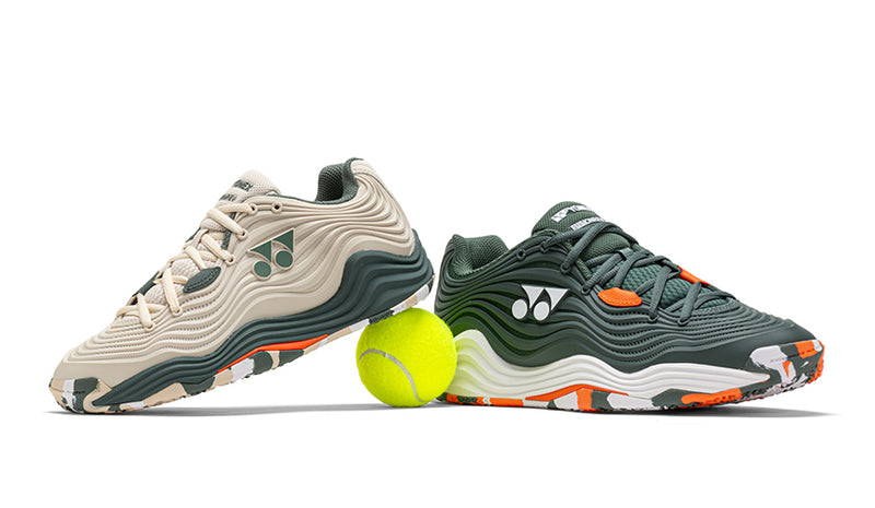 yonex tennis shoes on white background