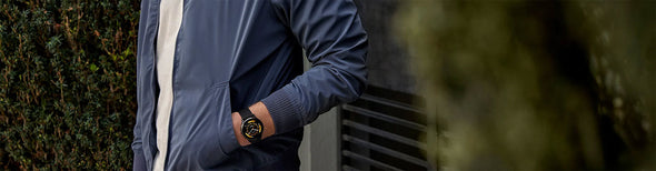 garmin venu 3 gps watch on mans wrist with hand in pocket