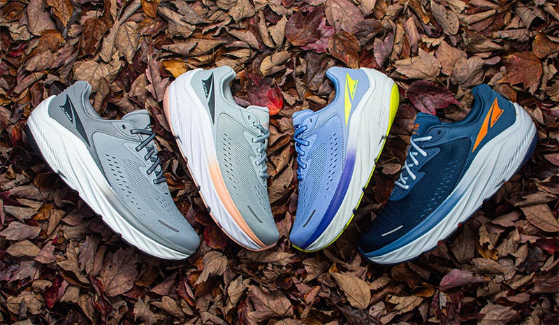 altra olympus 2 running shoes on shadowy fall leaves