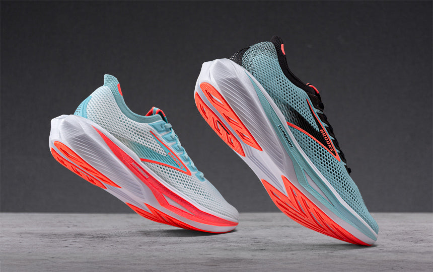 Brooks Hyperion 3 running shoes on a grey background