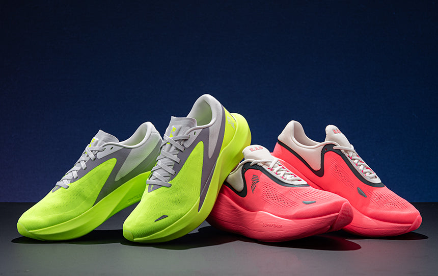 A person running on a sidewalk in pink and white R.A.D. UFO unisex running shoes