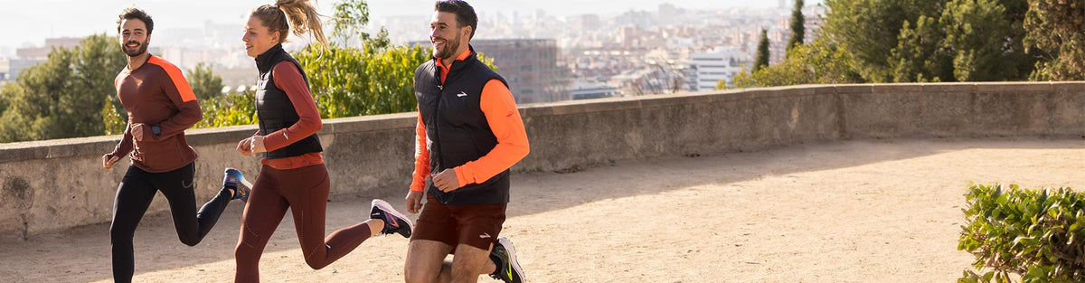 Persons running in Brooks shoes and fall clothing.