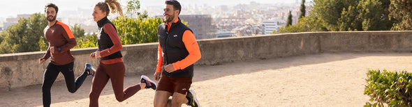 Persons running in Brooks shoes and fall clothing.