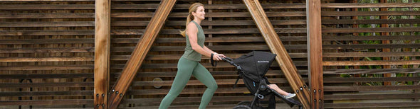 Woman pushing baby in Bumbleride Speed Jogging Stroller