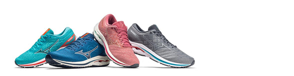 Colorful Men's and Women's Mizuno Wave Inspire 18 running shoes displayed on a clean white background.