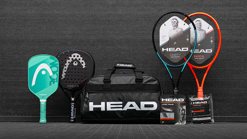 Collection of HEAD sports equipment including tennis, pickleball and padel gear on a dark background