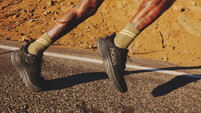 HOKA Challenger 8 trail running shoes in-use image