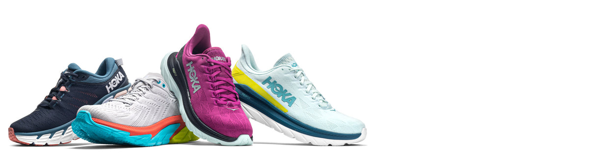 HOKA running shoes on a clean white background.