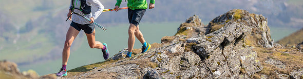 Man and woman in trail running shoes