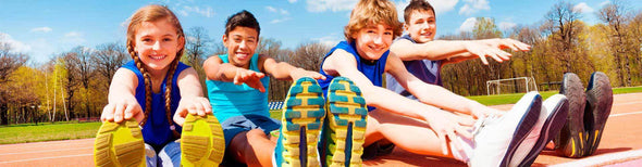 kids wearing running shoes on track
