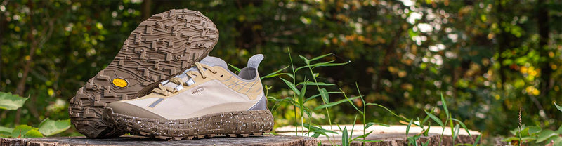 norda 001 regolith trail running shoes on natural background
