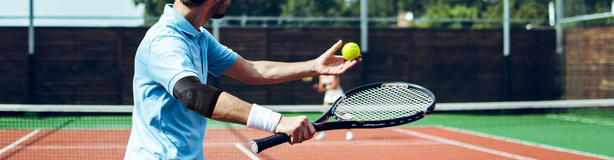 Man playing tennis in OS1st arm sleeve