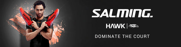 Man holding Salming Hawk shoes