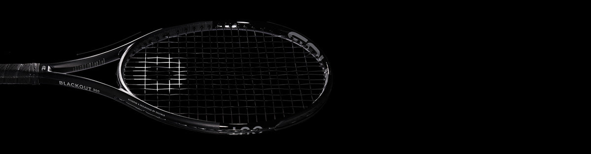Solinco Blackout tennis racquet on a black background.