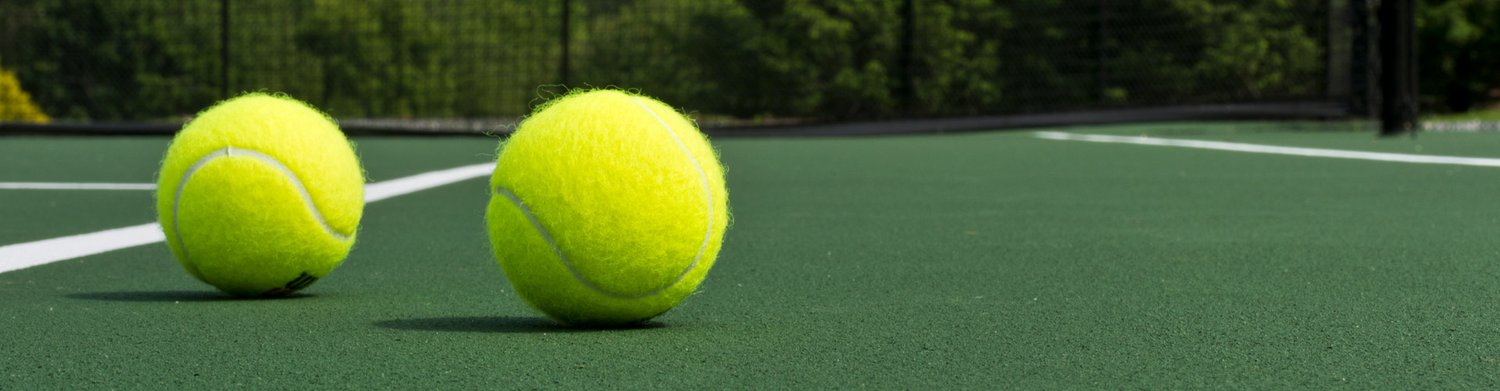 Tennis balls on court