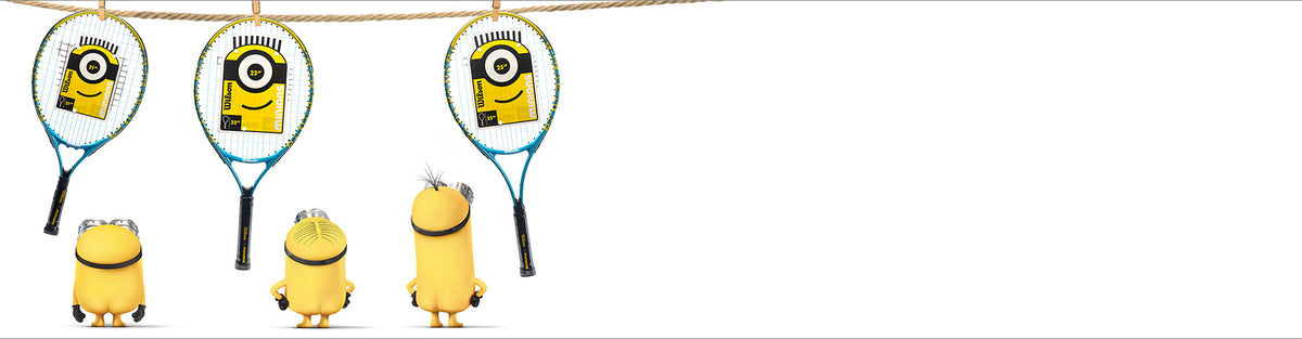 Image of the bare backsides of three Minion characters looking at three Wilson Minions tennis racquets.