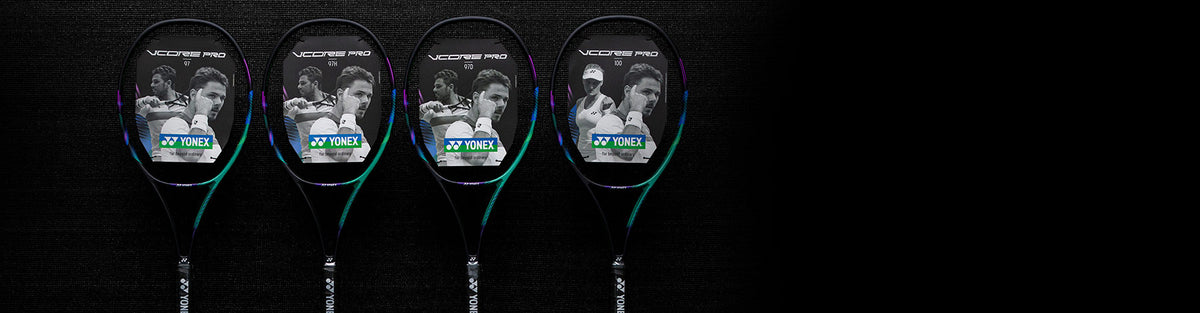 Four Yonex VCORE Green and Purple tennis racquets standing against a dark background