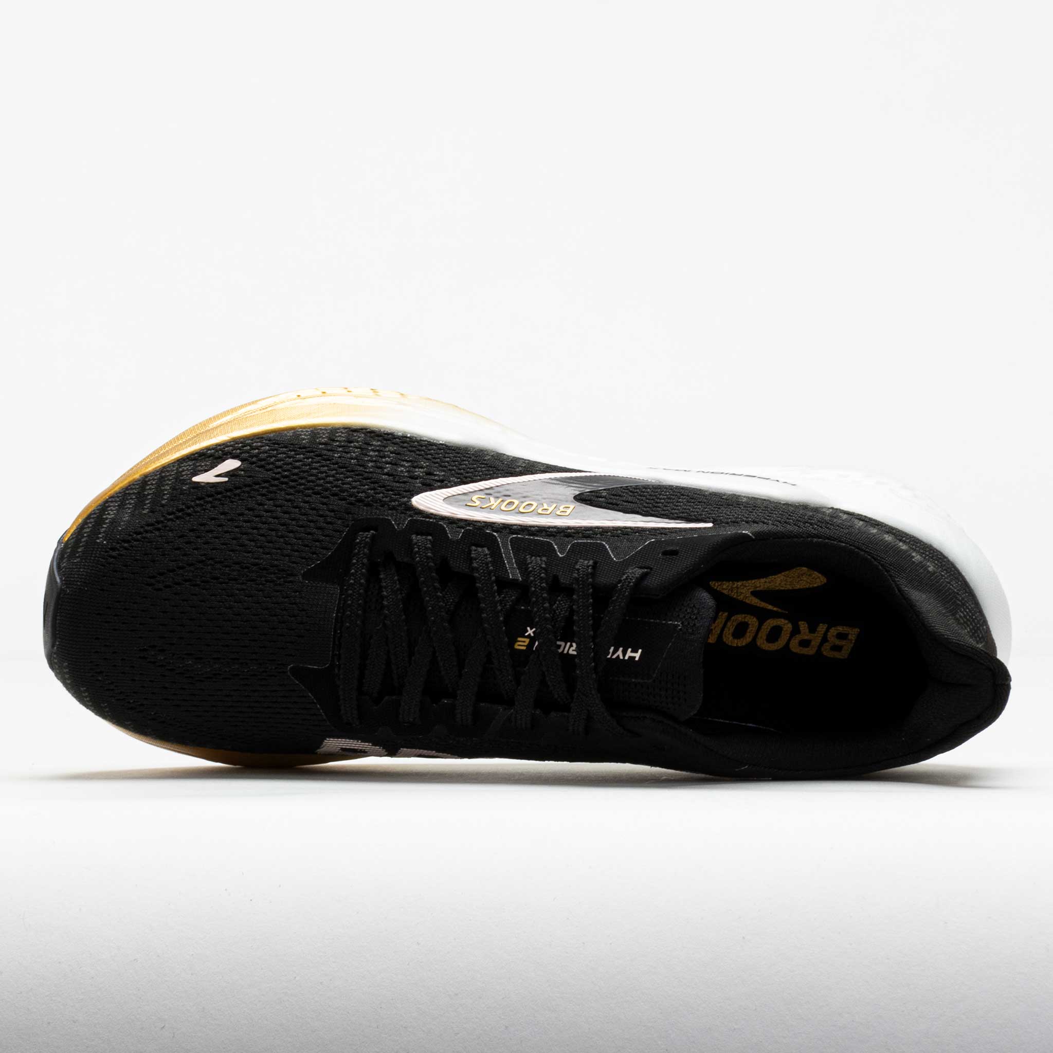 black and gold brooks shoes