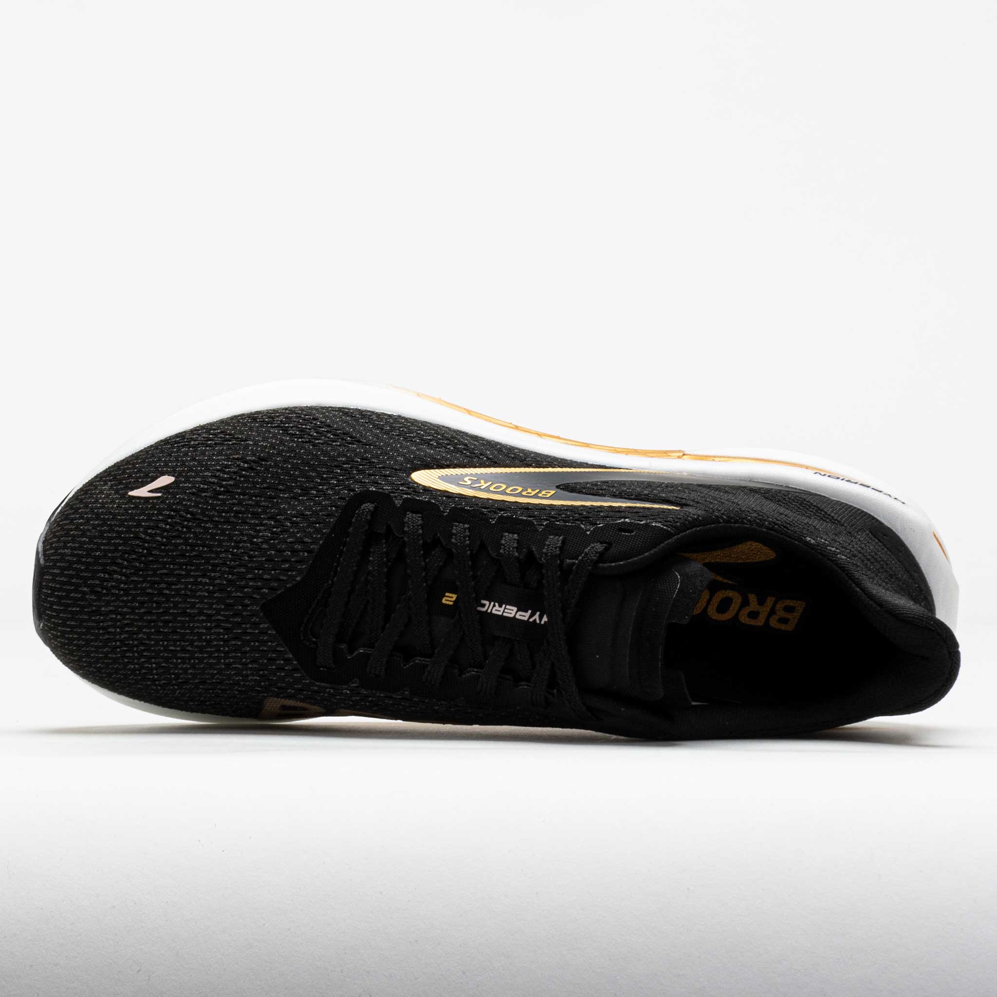 black and gold brooks shoes