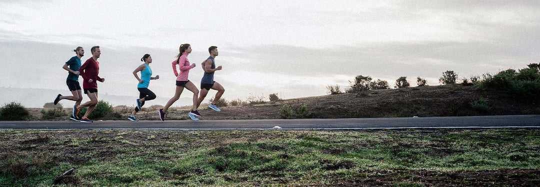 5 ppl running on road