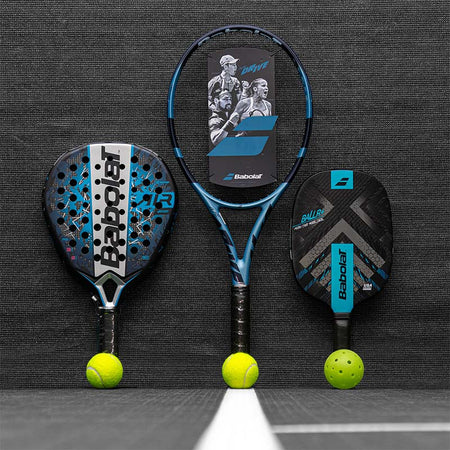 Padel, Tennis and Pickleball gear by Babolat on a dark surface with a black background