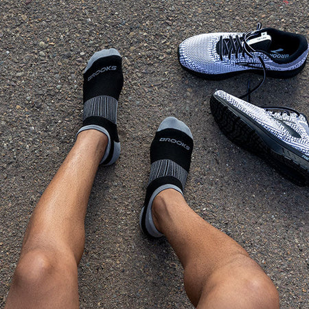 Man with Brooks socks and shoes