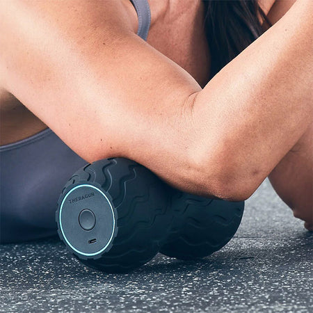 Theragun Wave Duo in use image