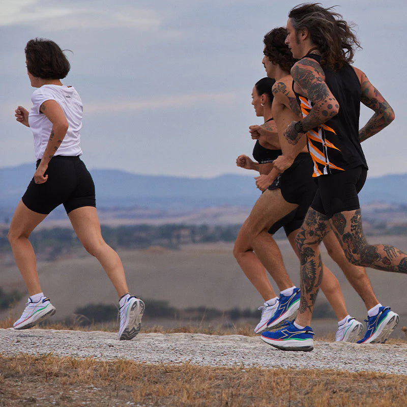 women running w/ diadora shoes